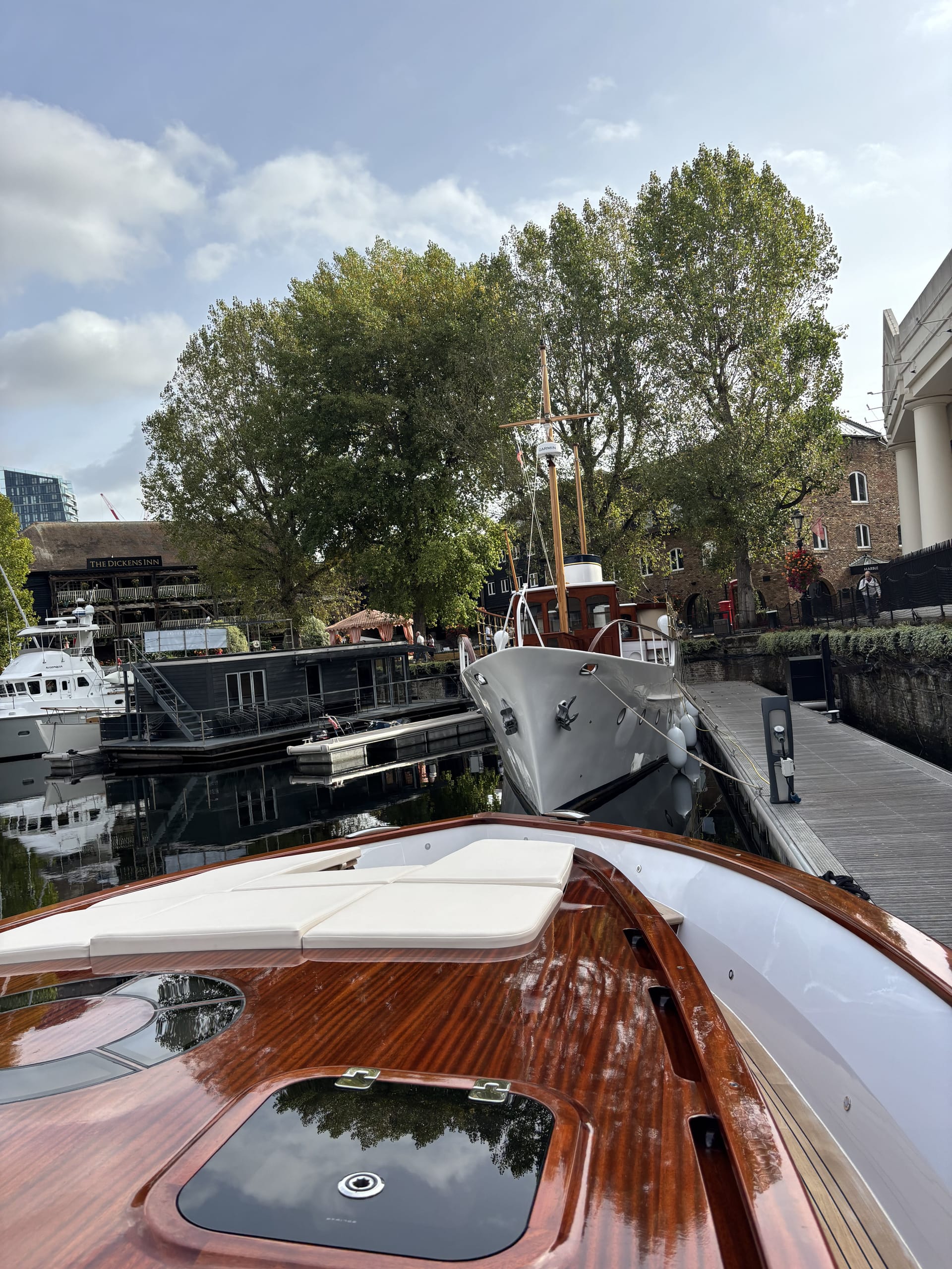 Varnished foredeck of the Spirit P50 with sunpads and flush hatch