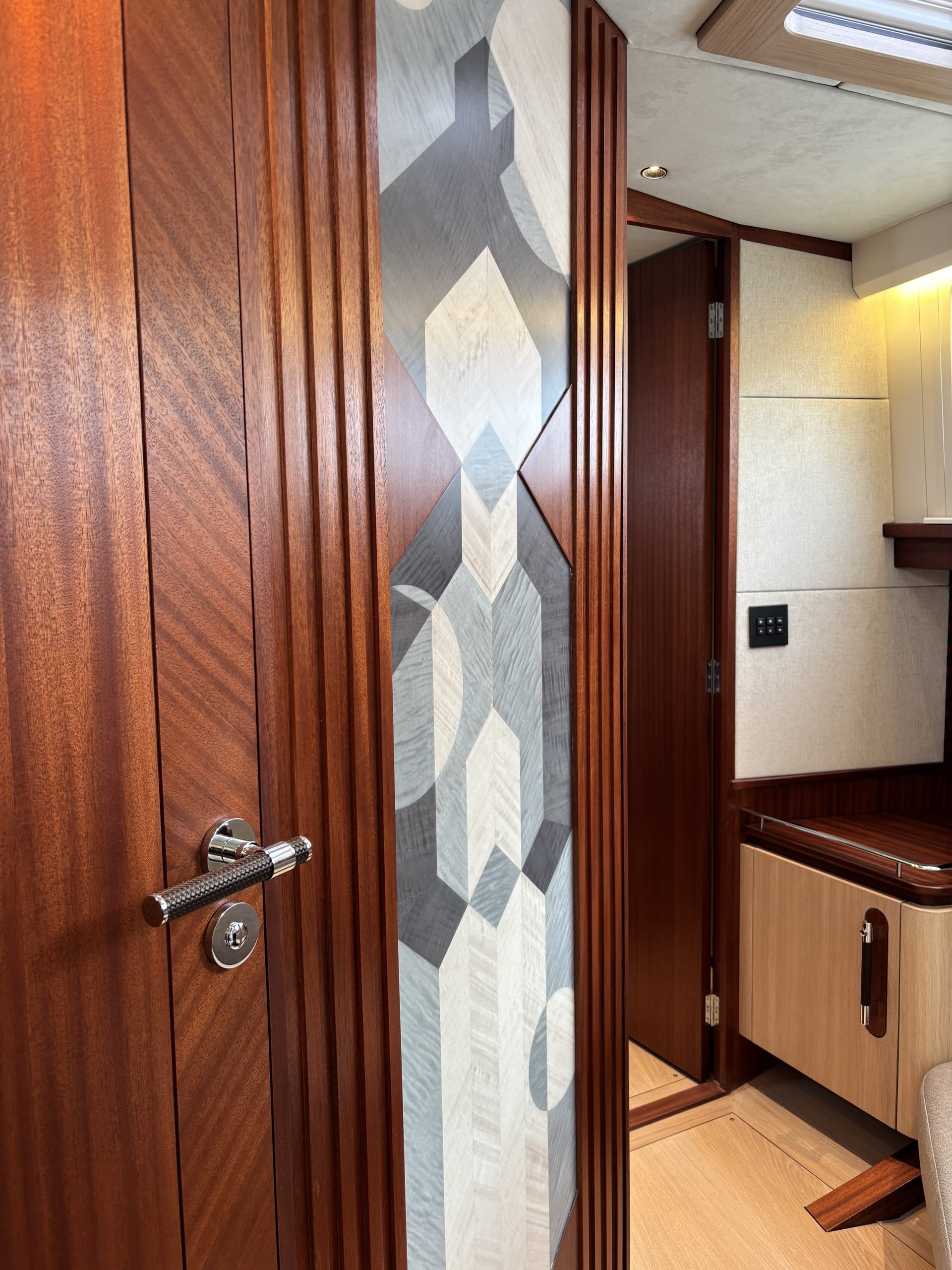 Mahogany door and marquetry panel in the Spirit P50 accommodation