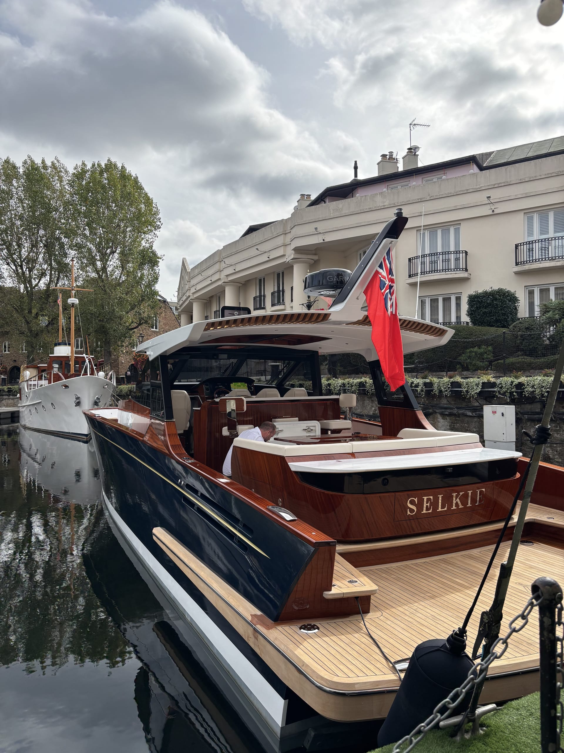 Stern quarter of the Spirit P50 Selkie with varnished transom and teak swim platform